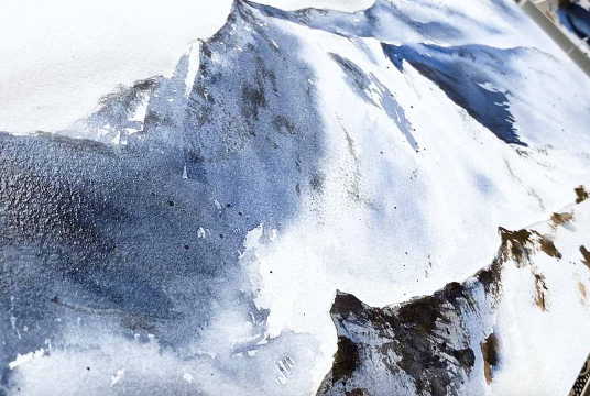 Painting snowy mountains with watercolor