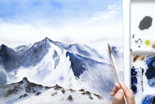 Painting snowy mountains with watercolor